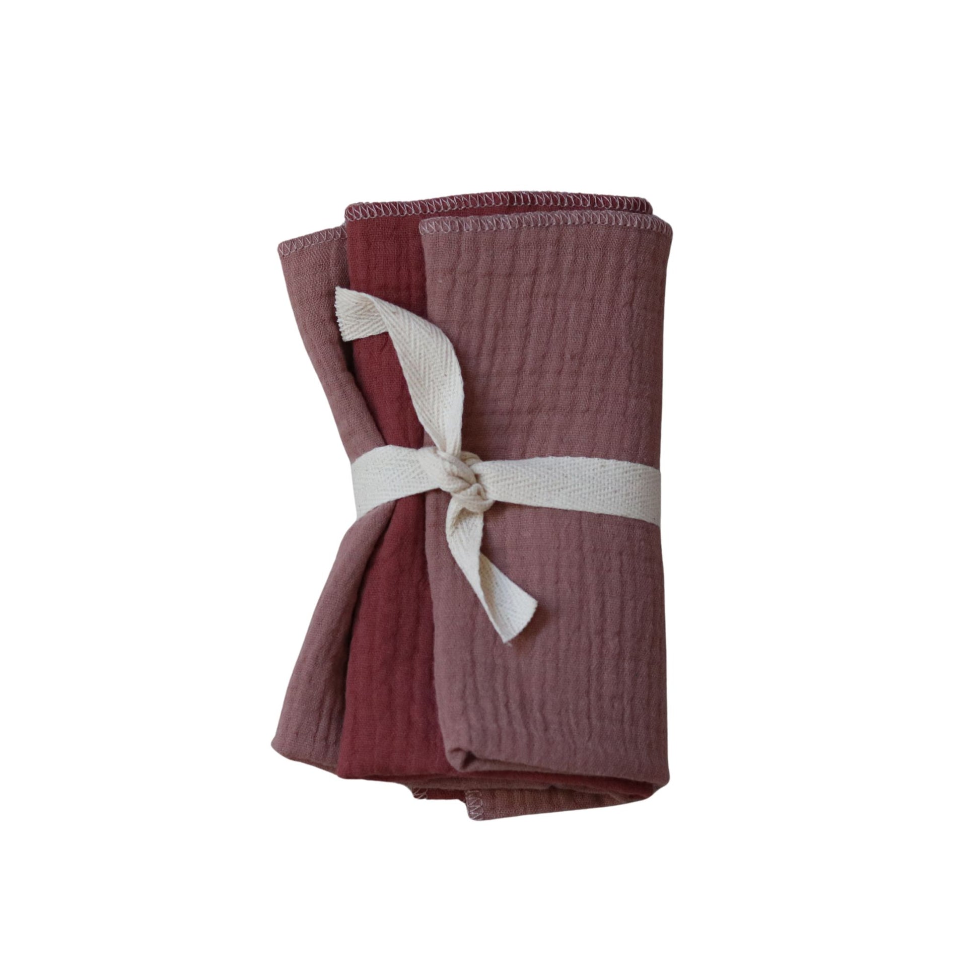 Delikatne pieluszki z muślinu dla niemowlaka, zawiązane wstążką